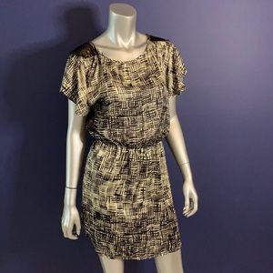 Black and cream printed dress with fishtail hem